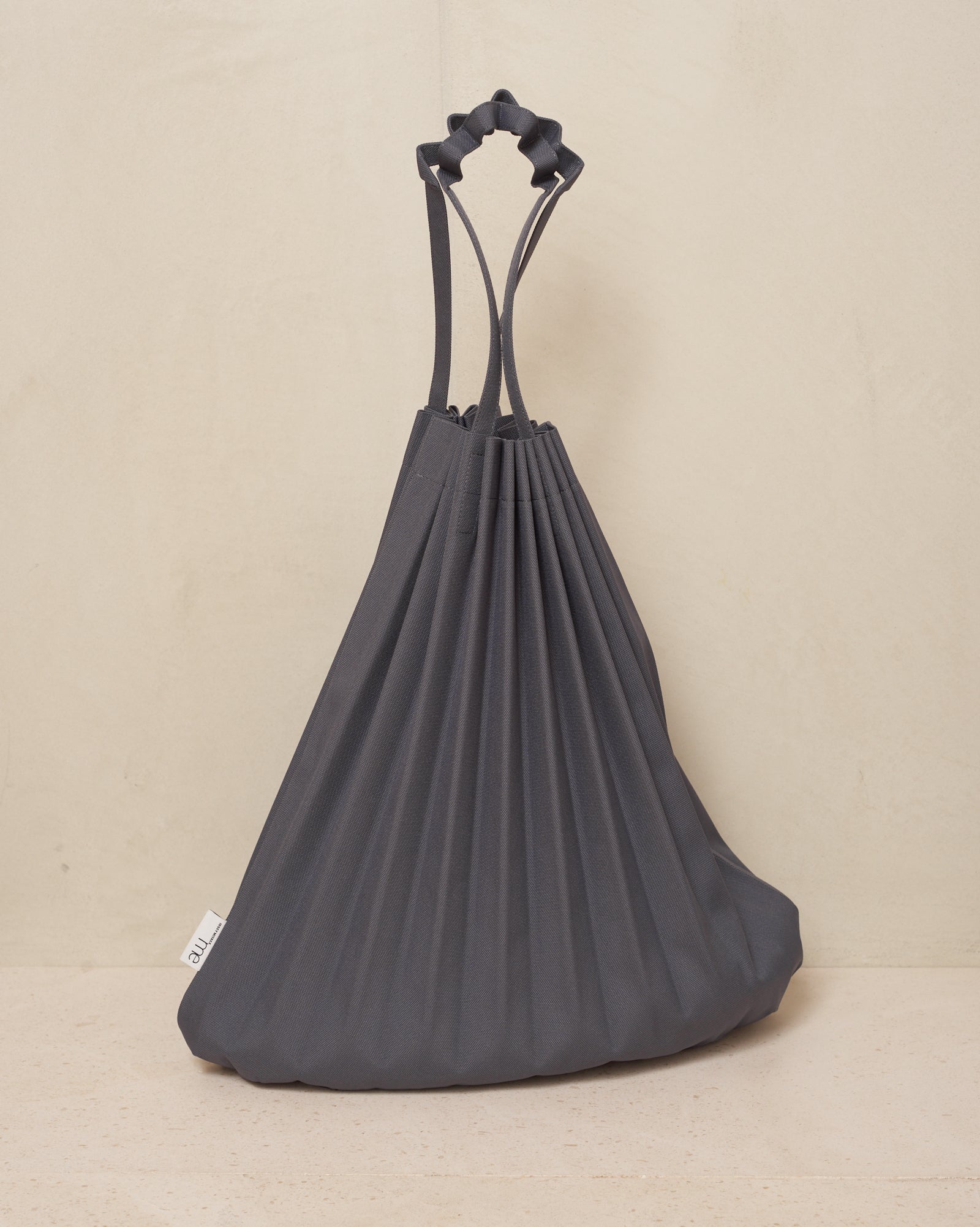 Issey miyake trunk pleats on sale bag