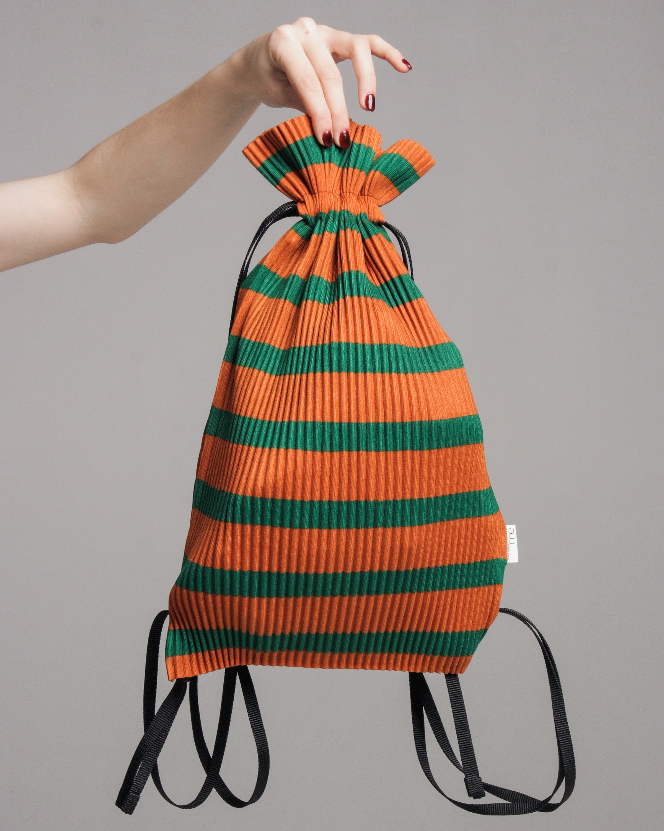 Pleats Please Issey Miyake Orange Drawstring Pleats Bag for Women