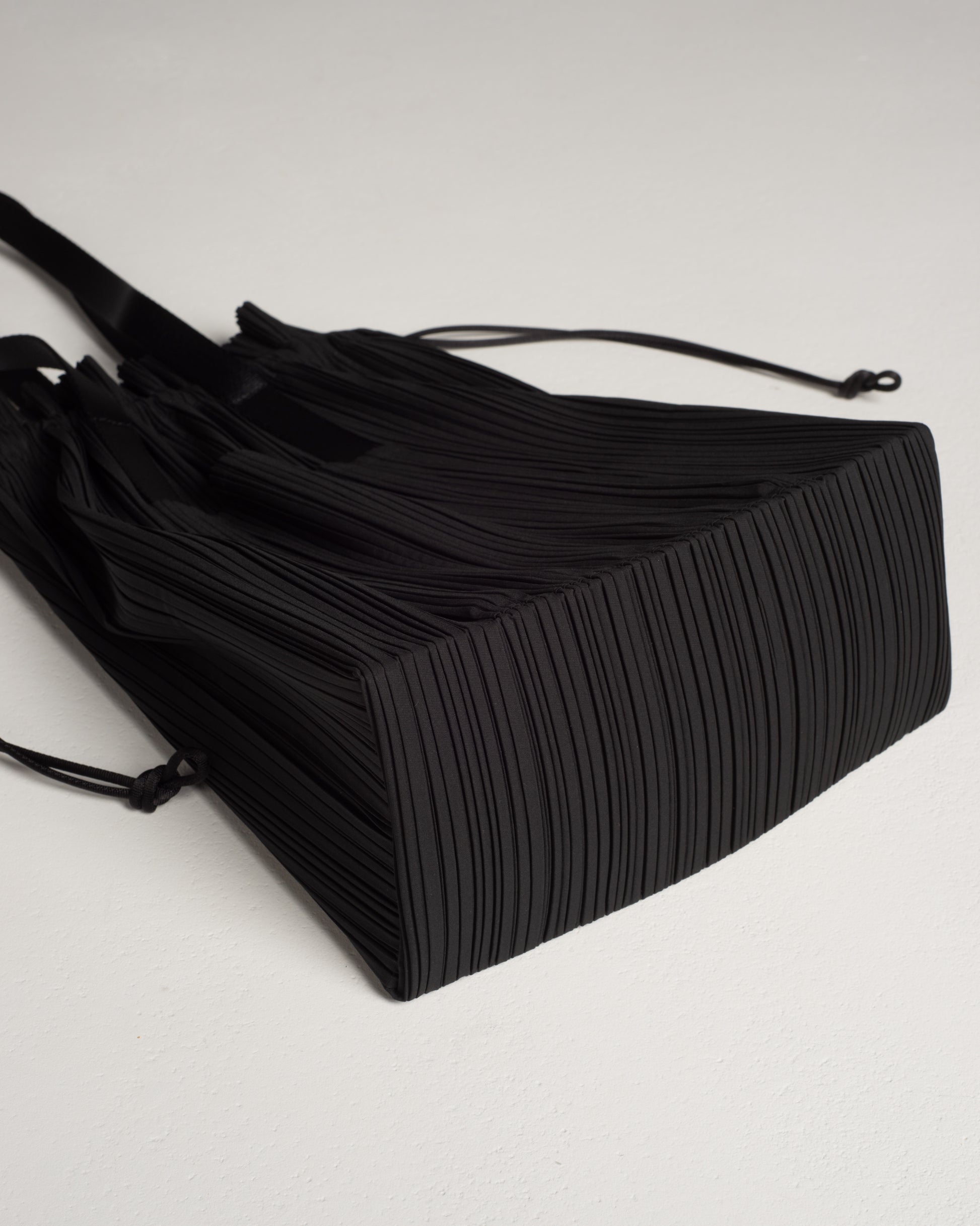 Issey Miyake Pleats Please Fringe Drawstring Bag in Black