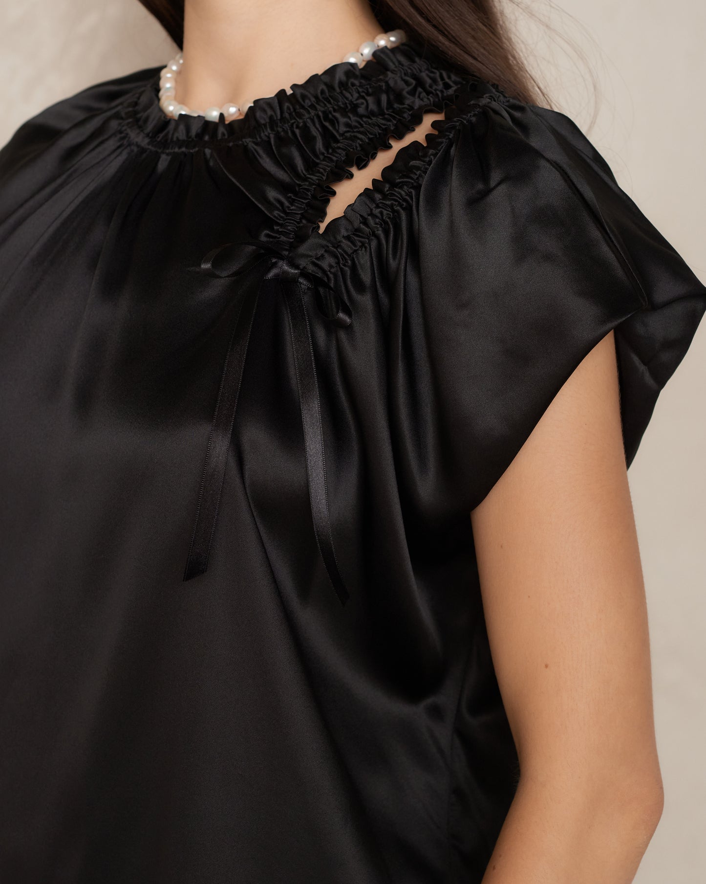 Black Cap Sleeve Shoulder Bite Top