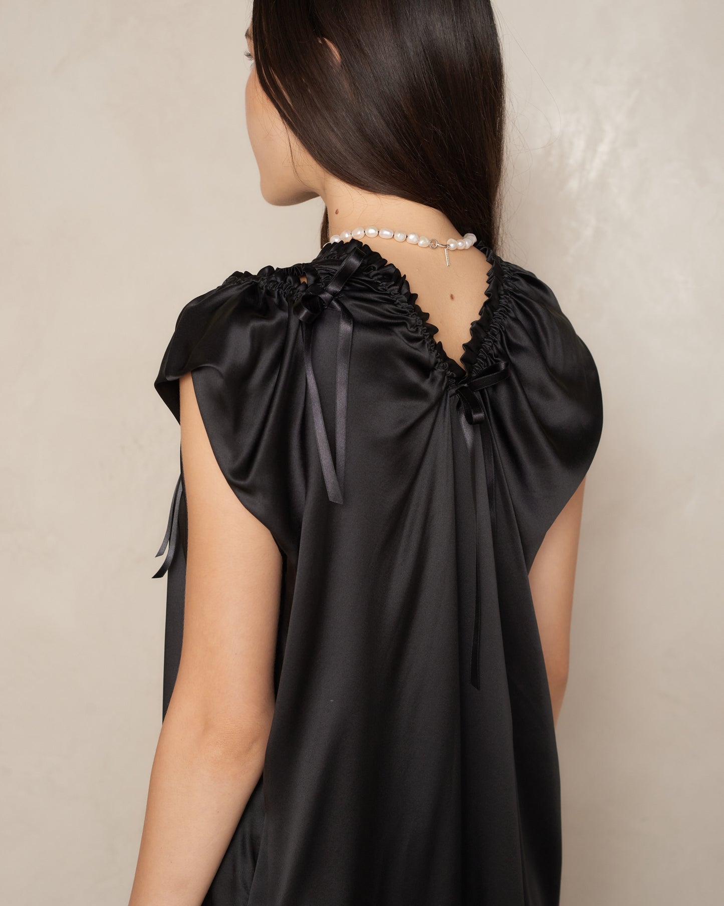 Black Satin Sack Shoulder Bite Dress